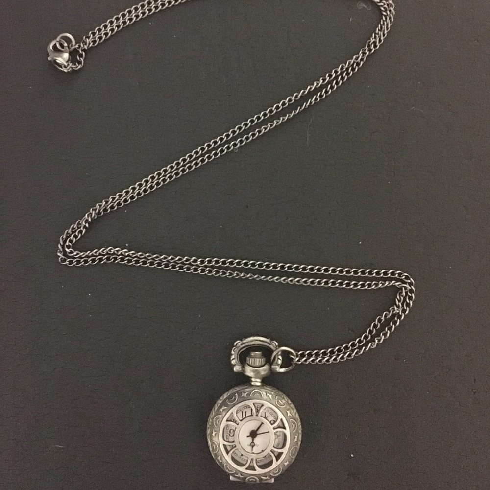 Clock locket necklace with flower engravings